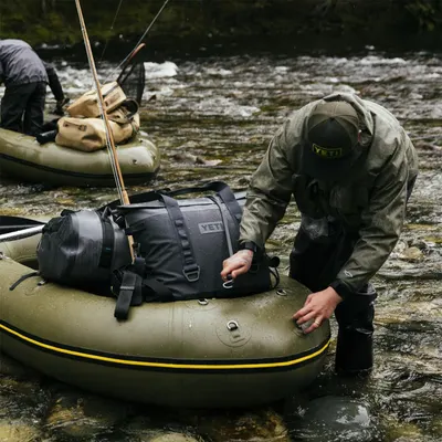 Shows the product in a real-world fishing environment to help shoppers visualize how it performs in rugged outdoor conditions.