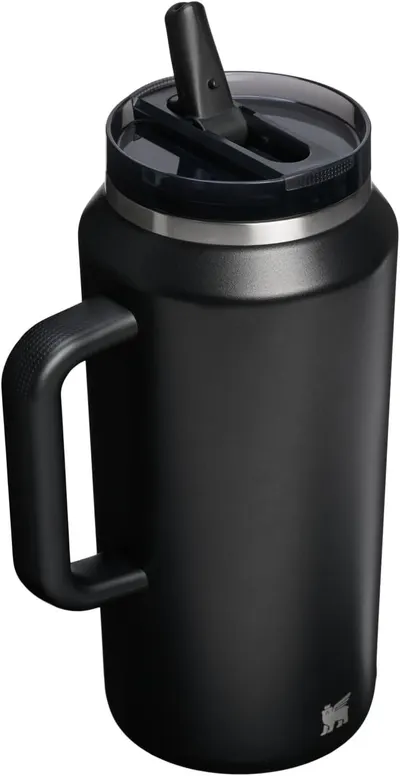 Clean white background product shot showing the tumbler with its flip straw lid in the closed position.