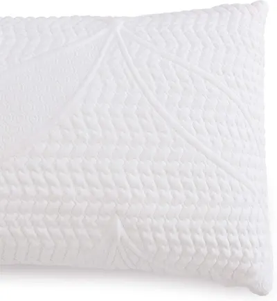 Highlights the corner and edge construction of the pillow to show quilting detail and build quality.