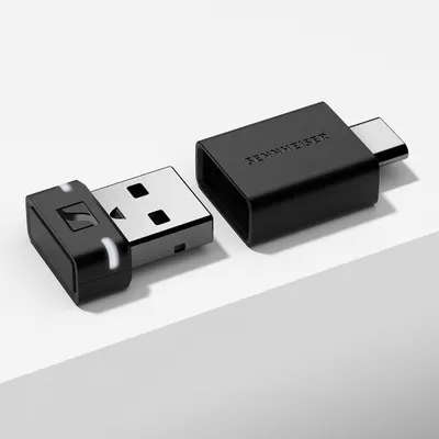 Shows the dongle and USB-C adapter clearly on a plain background so shoppers can see what is included.