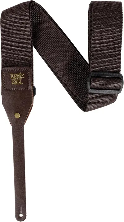 Shows the strap tab fitted to a guitar headstock so shoppers see how it attaches. Reassures shoppers that the strap fits a standard acoustic guitar without extra hardware.