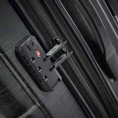 Close-up of the built-in TSA lock shows the bag can be opened by airport security without being broken into. The TSA-approved combination lock reassures…
