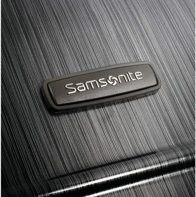 The close-up Samsonite badge on the brushed shell builds brand trust and recognition.