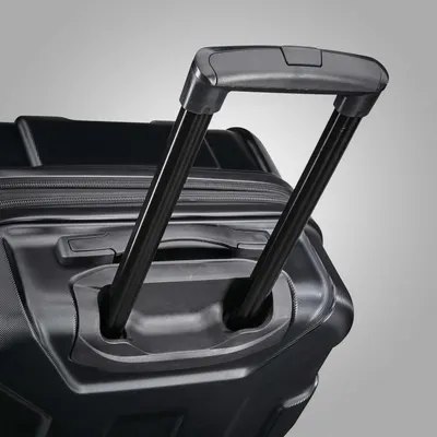 Sturdy extended handle shows the case rolls easily behind the shopper.