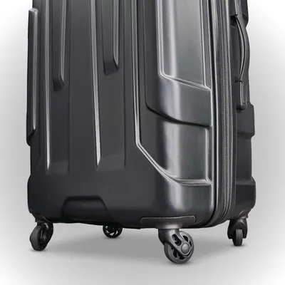 Close-up of the four spinner wheels shows smooth 360-degree movement through airports.
