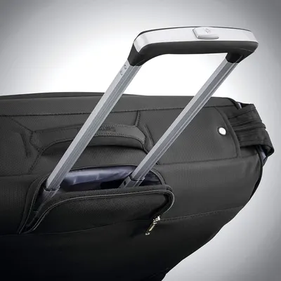 Shows the extended handle and bag body so shoppers see the rolling design is built for easy pulling.