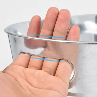 Shows the handle is smooth and comfortable to grip for carrying.