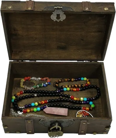 Shows the open trunk filled with jewelry to suggest real-world use for storing and displaying accessories.