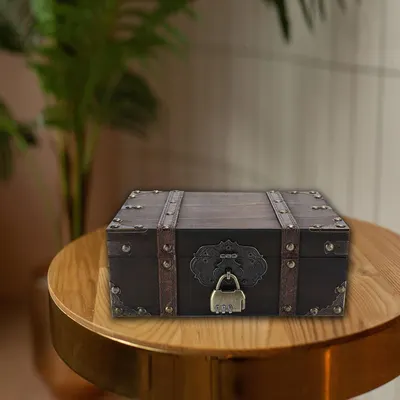 Shows the box styled on a wooden side table in a home setting to suggest decorative use.