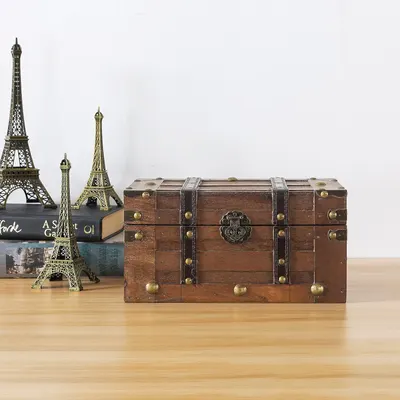Shows the trunk styled with decorative items to convey its vintage aesthetic in a single scene.