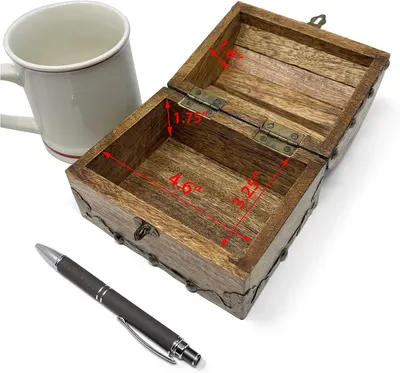 Shows the interior storage dimensions with a mug and pen for scale so shoppers can judge capacity.