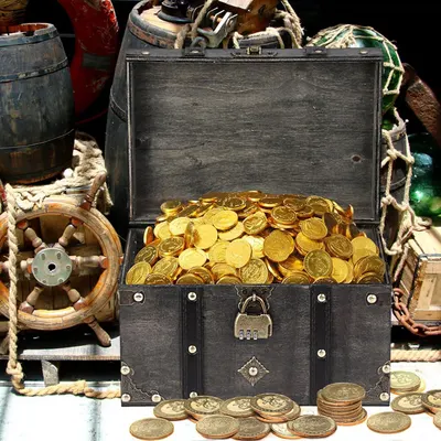 Shows the chest filled with gold coins in a pirate setting to communicate its use for pirate-themed play and decor.