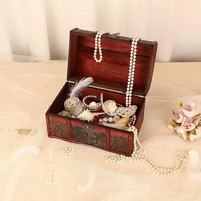 Shows generous interior space filled with jewelry and trinkets.