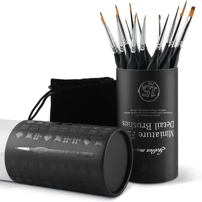 Shows the full set of 15 detail brushes along with the velvet pouch and tube packaging the buyer receives.