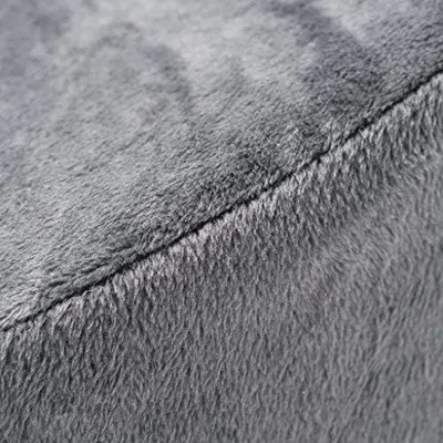 Close-up shows the plush velboa cover texture to convey a soft, comfortable feel.