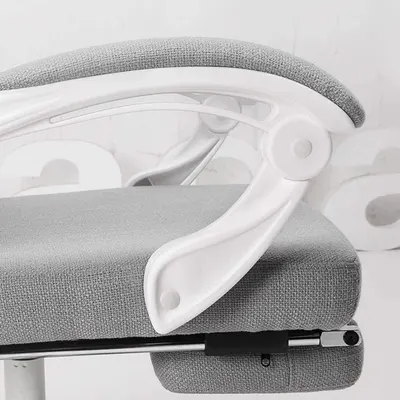 Close-up of the armrest and footrest mechanism to show sturdy, well-finished construction.