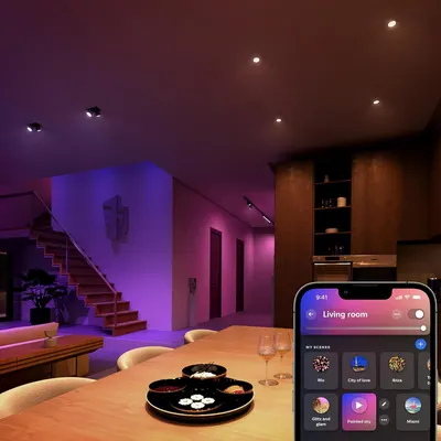 Shows the lights in a real living space with colorful ambiance to inspire shoppers.