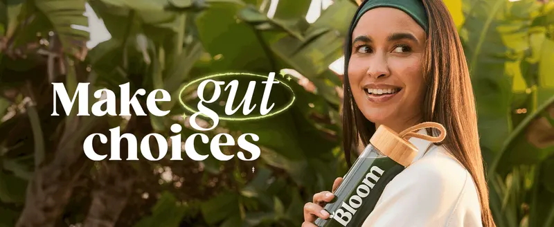 Uses an aspirational lifestyle photo and bold headline to position the product as a simple way to support gut health.