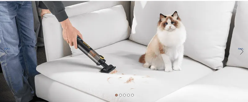 Shows the product being used in a real home setting to help shoppers envision it solving a common pet-hair cleaning problem.
