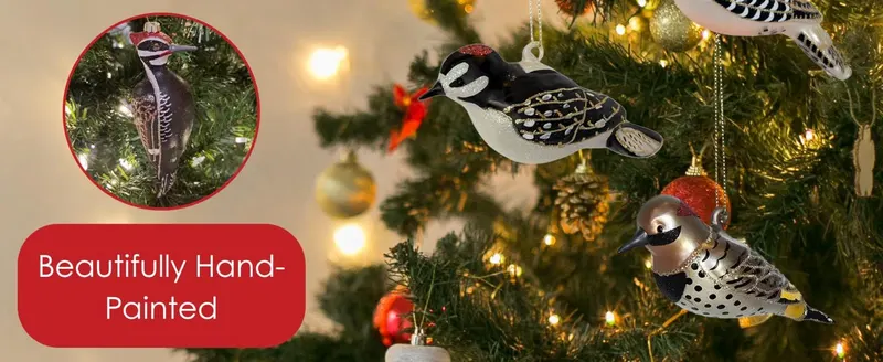 Positions the product as a holiday decoration item and gift option, showcasing hand-painted bird ornaments in a festive Christmas tree setting to appeal to…